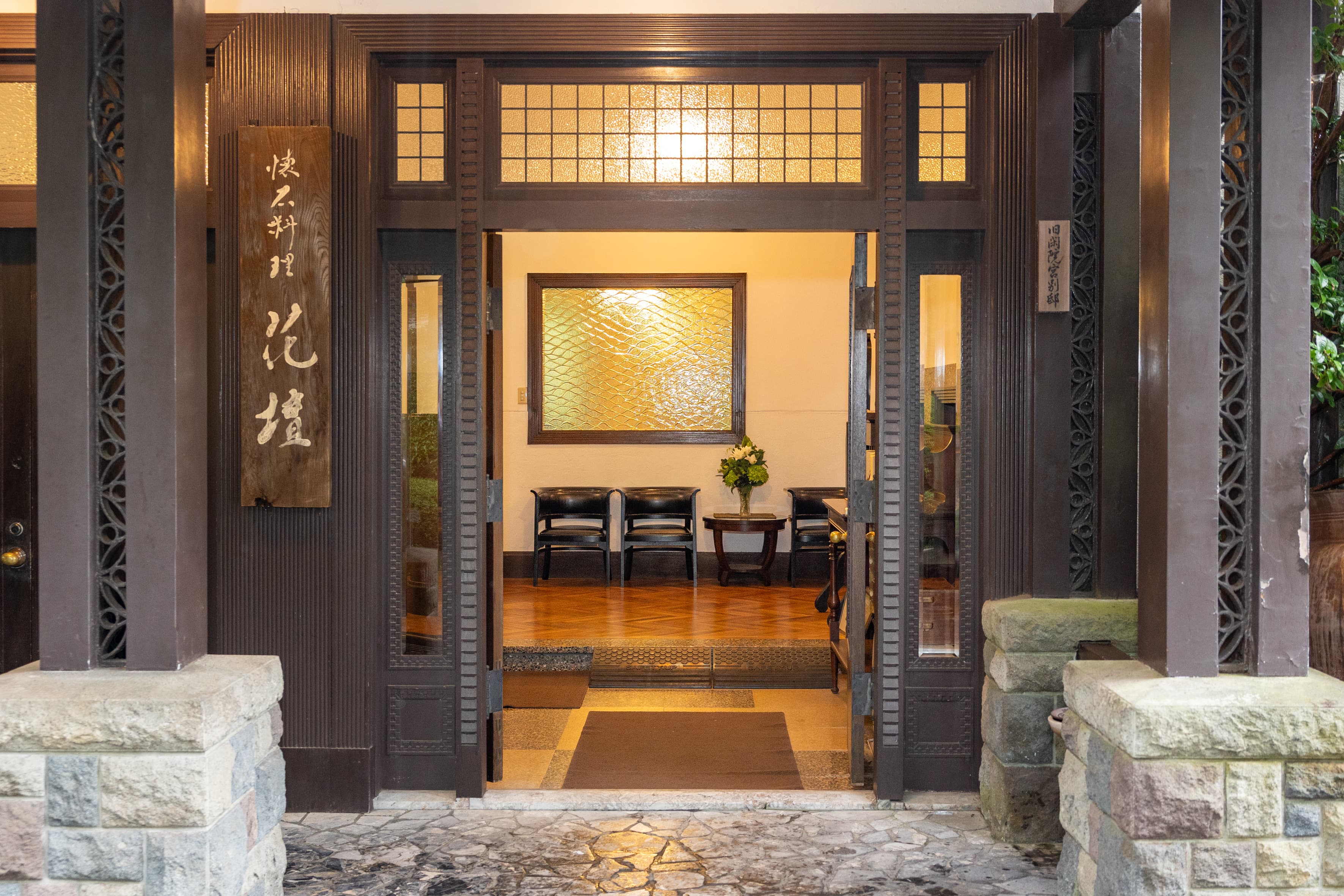 Lantern-lit street in a traditional Japanese district at twilight